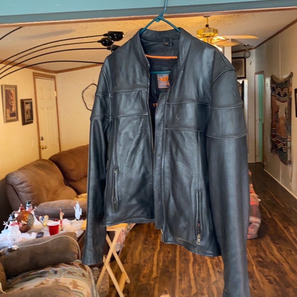 Black leather jacket. Heavy. Like new. Size 2 XL